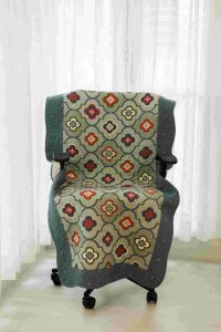 Peacock blue abstract quilted chair sujni