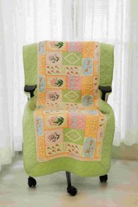 Pastel green and pink flower quilted chair sujnis