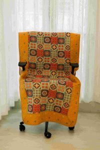 Yellow abstract quilted chair sujni