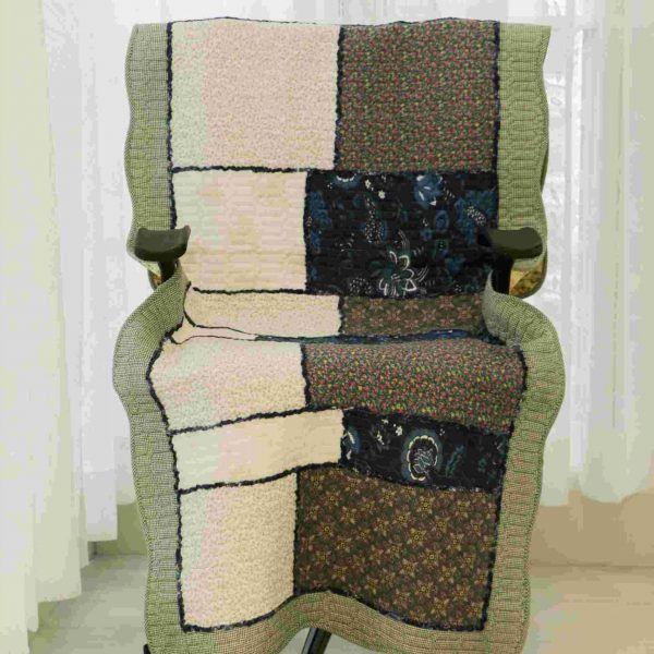 Sage green patterned quilted�chair sujni