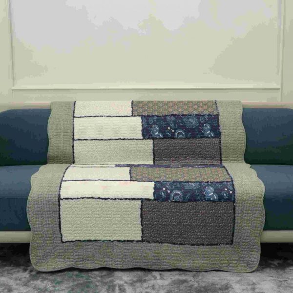 Sage green patterned quilted sofa sujni