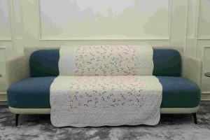Grey with daisy quilted sofa sujni