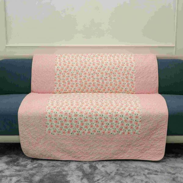 Floral pink quilted sofa sujni